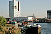 Modern Building 'The Whale', Cohabiting With Houseboats At The Foot Of Java And Knsm Eiland, Amsterdam, Netherlands
