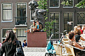 Sidewalk Cafe In Front Of The Sculpture Of Multatuli, Singel And Molsteeg, Amsterdam, Netherlands
