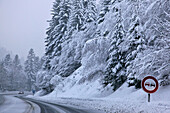 Car On A Snow-Covered And Icy Road In Cantal (15), Auvergne, France