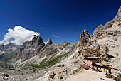 Grasleitenpass hut above Vajolet valley with Vajolet towers and king Laurin mountain face, Rosengarten group, Dolomites, Trentino-Alto Adige/South Tyrol, Italy