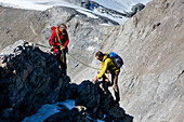 Two mountaineers ascending, Clariden, Canton of Uri, Switzerland