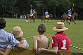 Spectators visiting polo game, Hanover, Lower Saxony, Germany