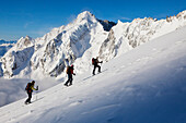 Three back-country skiers, Val Ferret, Canton of Valais, Switzerland