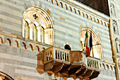 Balcony with flags, Broletto (ancient town hall), Como, Lombardy, Italy