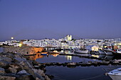Houses and church at moonrise, Naoussa, island of Paros, the Cyclades, Greece, Europe