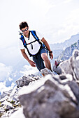 Man hiking on Rumer Spitze, Innsbruck, Karwendel range, Tyrol, Austria