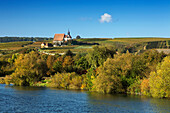 View over Main river to pilgrimage church Maria im Weingarten, Volkach, Franconia, Bavaria, Germany