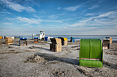 Roofed wicker beach chairs at beach, Carolinensiel-Harlesiel, East Frisia, Lower Saxony, Germany