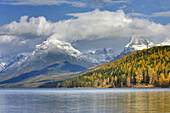 Peaks along Lake McDonald dusted in snow from autumn storm,  Glacier National Park Montana USA