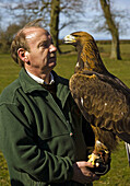 Facloner with Steppe Eagle,  a predator bird indiginous to central Europe and central Asia. The bird is 80cm tall and has a wind span of 2 metres