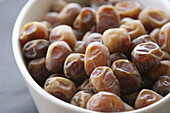 close-up Fresh arabian dates on bowl