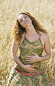 Woman breathing in the countryside