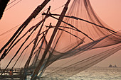 Fishermen and traditional fishing nets,  Fort Cochin,  Kerala