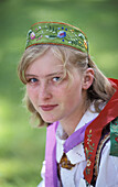 YOUNG WOMAN IN TRADITIONAL DRESS,  SONG FESTIVAL,  VILNIUS,  LITHUANIA