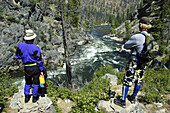 River guides scouting Pistol Creek rapid on the Middle Fork of the Salmon river Idaho,  United States