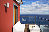Portugal,  Madeira Islands Ponta do Sol Terrace overlooking the sea at Quinta da Rochina,  Design Hotel