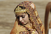 Omani girl in traditional dress with jewelry,  Nakhl,  Batinah Region,  Sultanate of Oman,  Arabia,  Middle East