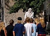 Street performer at Main Market Square,  Krakow,  Poland