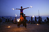 Jugglers and fire-eaters at Café del Mar Ibiza, Balearic Island, Spain
