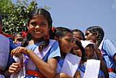 Girls wearing school uniforms in the sunlight, Bastar, Chhattisgarh, India, Asia