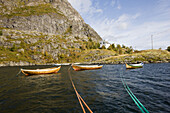 Rowing boats on a lake, Lofoten, Norway, Scandinavia, Europe