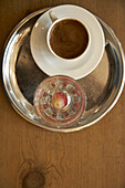 Espresso served with a glass of water, The House Café, designed by Autoban, Istanbul, Turkey