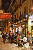 Guests in bars in the evening, Calle de Huertas, Madrid, Spain