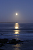 Full moon over Atlantic Ocean, Langebaan, Western Cape, South Africa