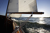 Sailing yacht on lake Chiemsee, Fraueninsel, Bavaria, Germany