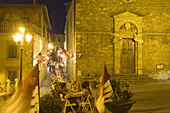 Festival of a city district on Piazza Garibaldi, Montalcino, Tuscany, Italy