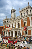 Holy Week procession passing by the Town Hall in Main Square, Valladolid. Castilla-Leon, Spain