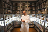Chef Juan Maria Arzak in his cooking laboratory pantry with seeds, fruits and plants from around the world, San Sebastian, Guipuzcoa, Basque Country, Spain