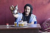 Berber performing the traditional tea ceremony in Marrakech, Morocco