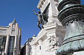 Monument of the Portuguese Restauration War and Eden Theater at Praça dos Restauradores, Lisbon, Portugal