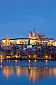 prague in winter - hradcany castle and mala strana at dusk