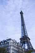 Eiffel Tower and Avenue de Suffren buildings in the morning, defocussed, Paris, France