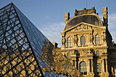 Louvre Museum and the Pyramid at sunset, Paris, France