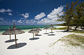 Beach umbrellas, Belle Mare, Eastern Mauritius, Mauritius