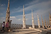 Italy, Lombardy, Milan, Piazza Duomo, Duomo cathedral roof, visitors, NR