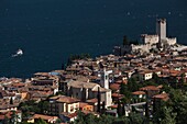 Italy, Veneto, Lake District, Lake Garda, Malcesine, aerial town view and Castello Scaligero castle from Monte Baldo