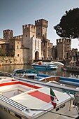 Italy, Lombardy, Lake District, Lake Garda, Sirmione, Castello Scaligero castle, dawn