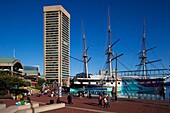 USA, Maryland, Baltimore, Inner Harbor, Harborplace Mall and USS Constellation, historic ship