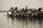 Overloaded passenger boat on the Niger river, Mopti, Mali, Africa