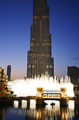 The illuminated Dubai Fountain in the evening, Burj Khalifa, Burj Chalifa, Dubai, UAE, United Arab Emirates, Middle East, Asia