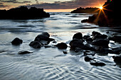 Dawn light on Sumner beach seascape, Christchurch, Canterbury, New Zealand