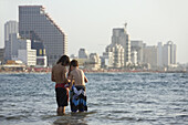 Three boys in the sea, Tel Aviv, Israel, Middle East