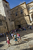 Tourists visiting the Church of the Holy Sepulchre, Jerusalem, Israel, Middle East