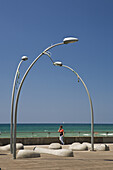 Seaside promenade with street lamps in the sunlight, Namal, Tel Aviv, Israel, Middle East
