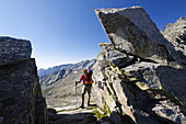 Man hiking at Col di Bardoney, Gran Paradiso National Park, Italy