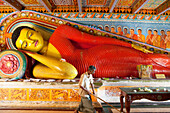 Larger than life sized Buddha statue inside the Isurumunjya temple, Isurumuni Maha Vihara, Sacred City, Anuradhapura, Sri Lanka, Asia